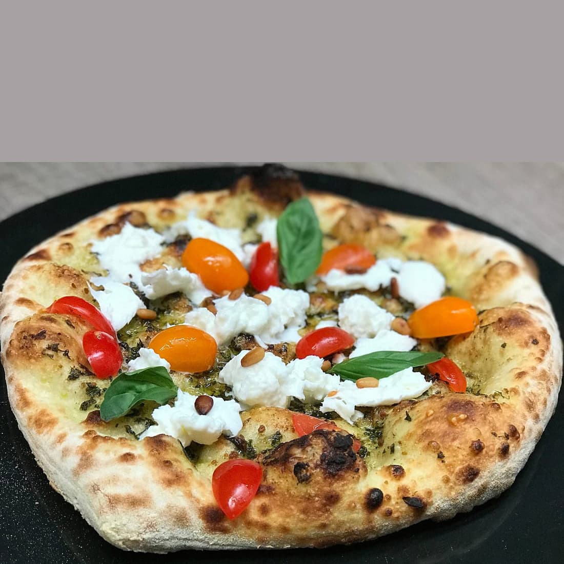 Before — Pizza shot from overhead — phone photo relit to studio quality with PlateRefresh